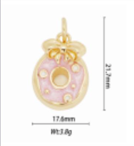 pink donut with bow charm