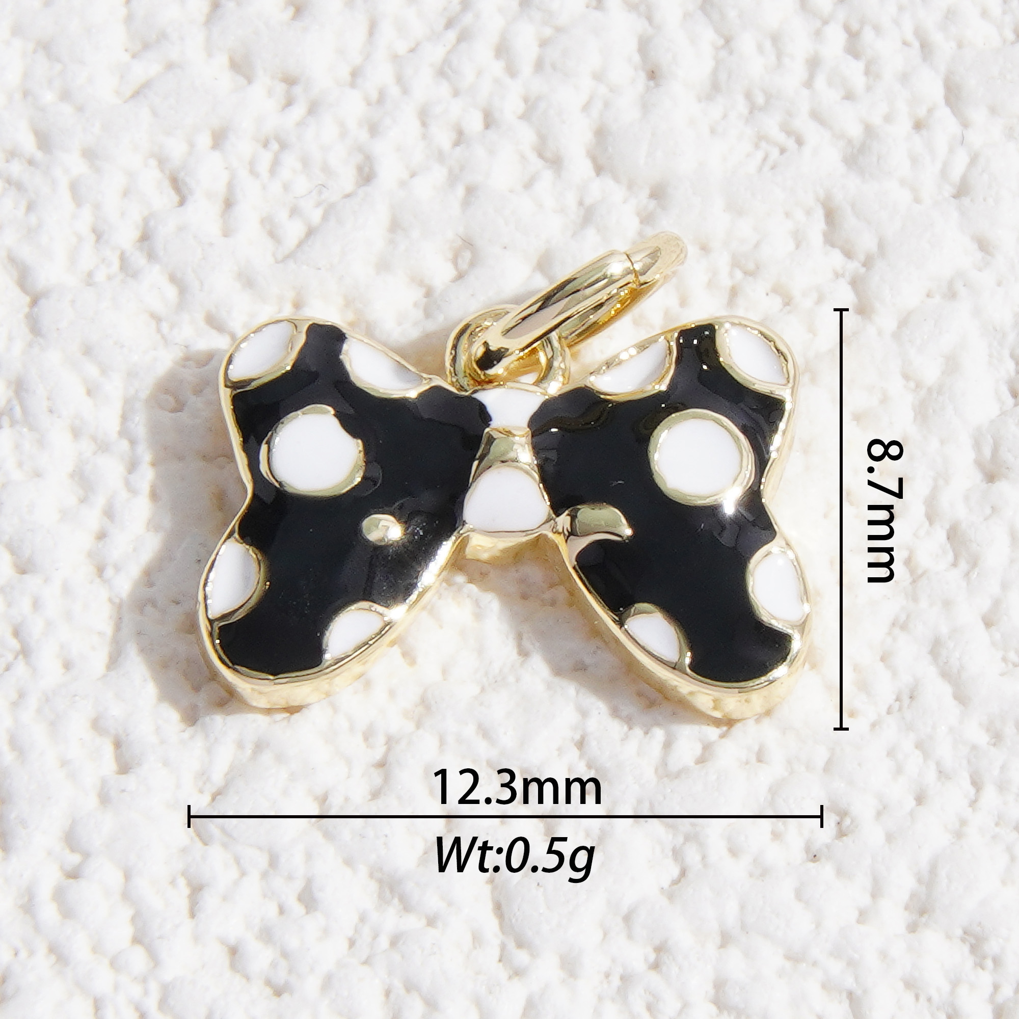 Polka dot black bow charm
