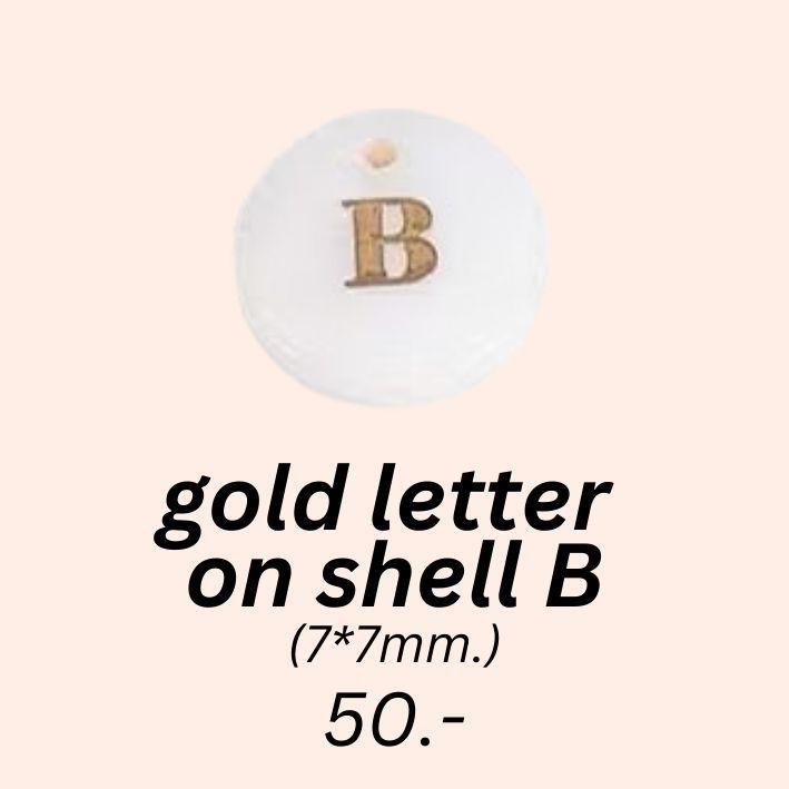 gold letter 
on shell B charm