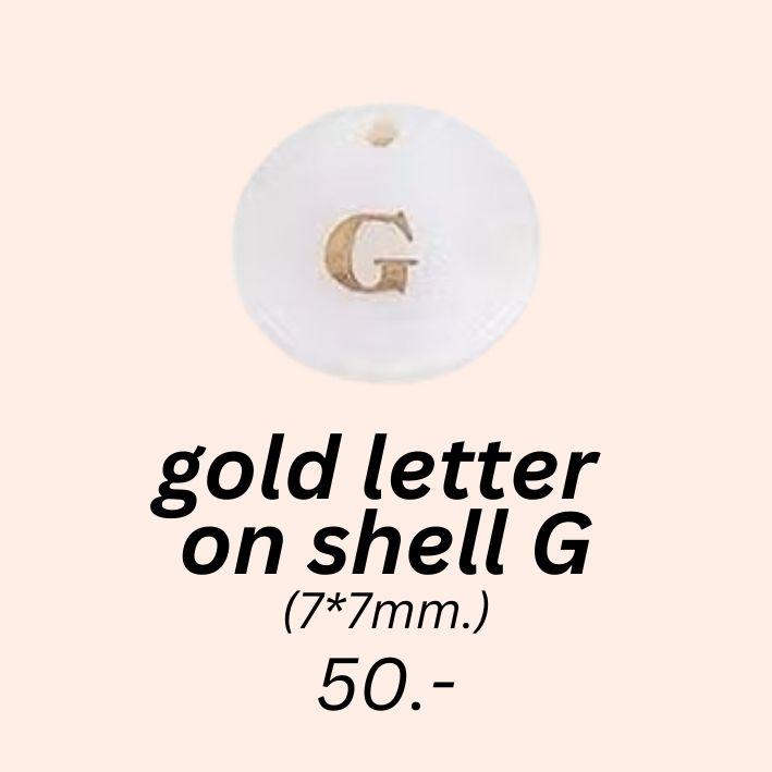 gold letter 
on shell g charm