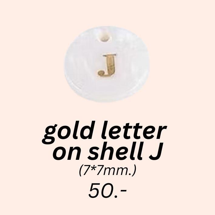 gold letter 
on shell J charm