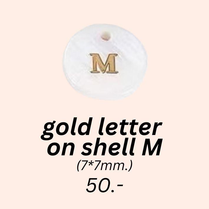 gold letter 
on shell M charm