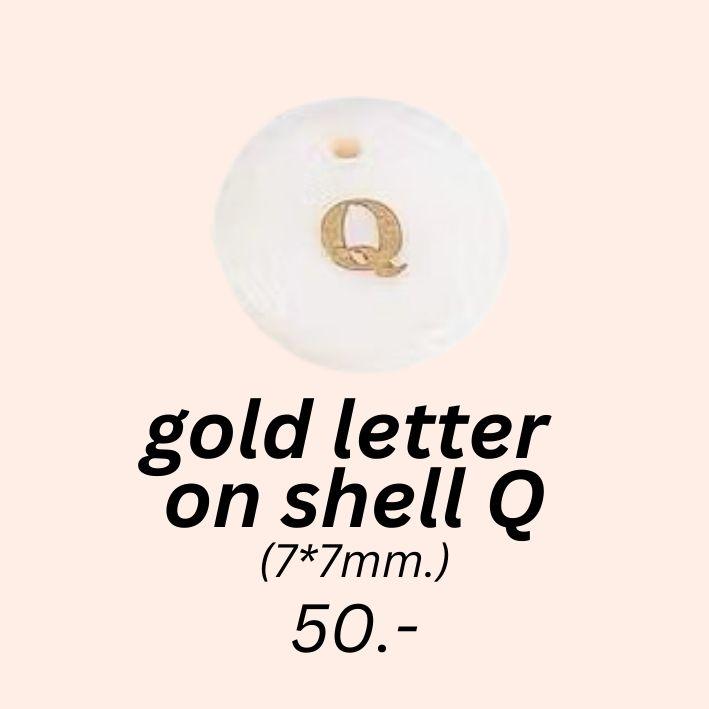 gold letter 
on shell Q charm