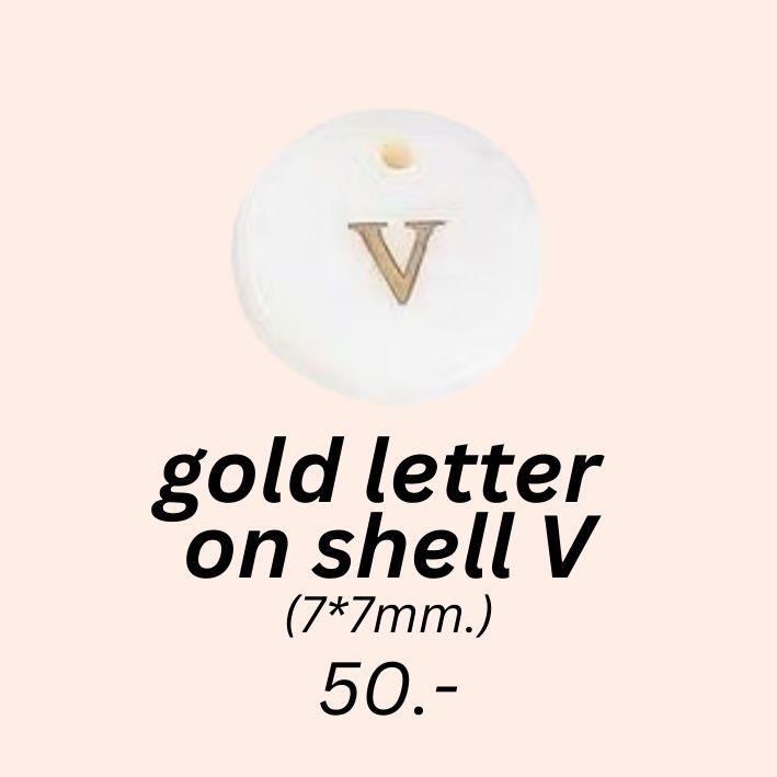 gold letter 
on shell V charm