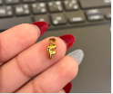 Embossed silver letter F charm
