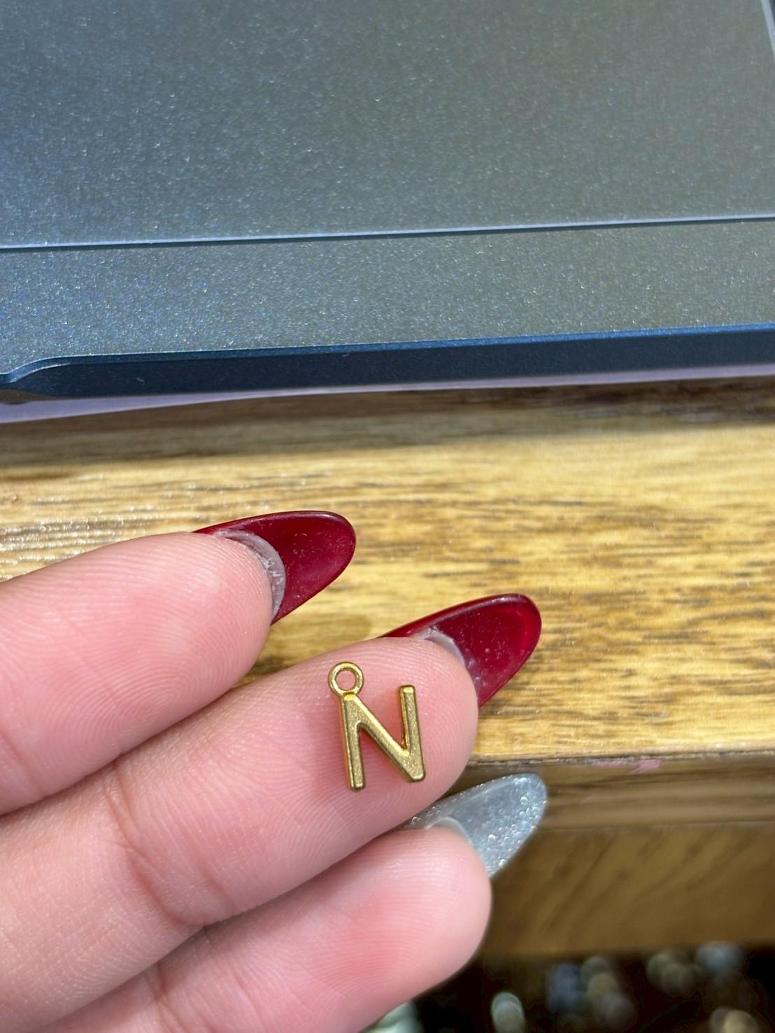 Plain silver letter J charm